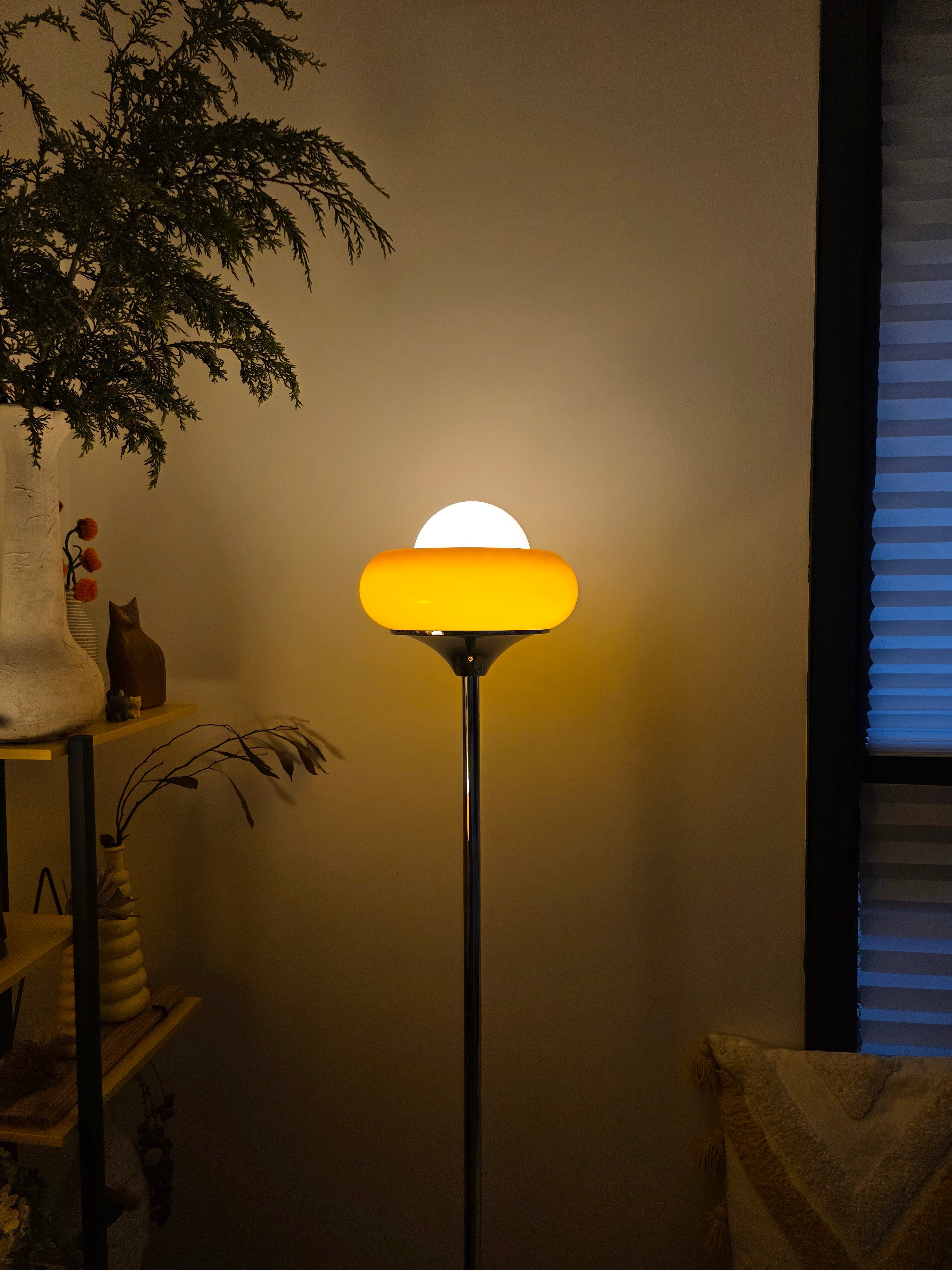 Modern Egg Tart Lamp  in chrome and glass – stylish retro lighting for bedrooms or lounges.