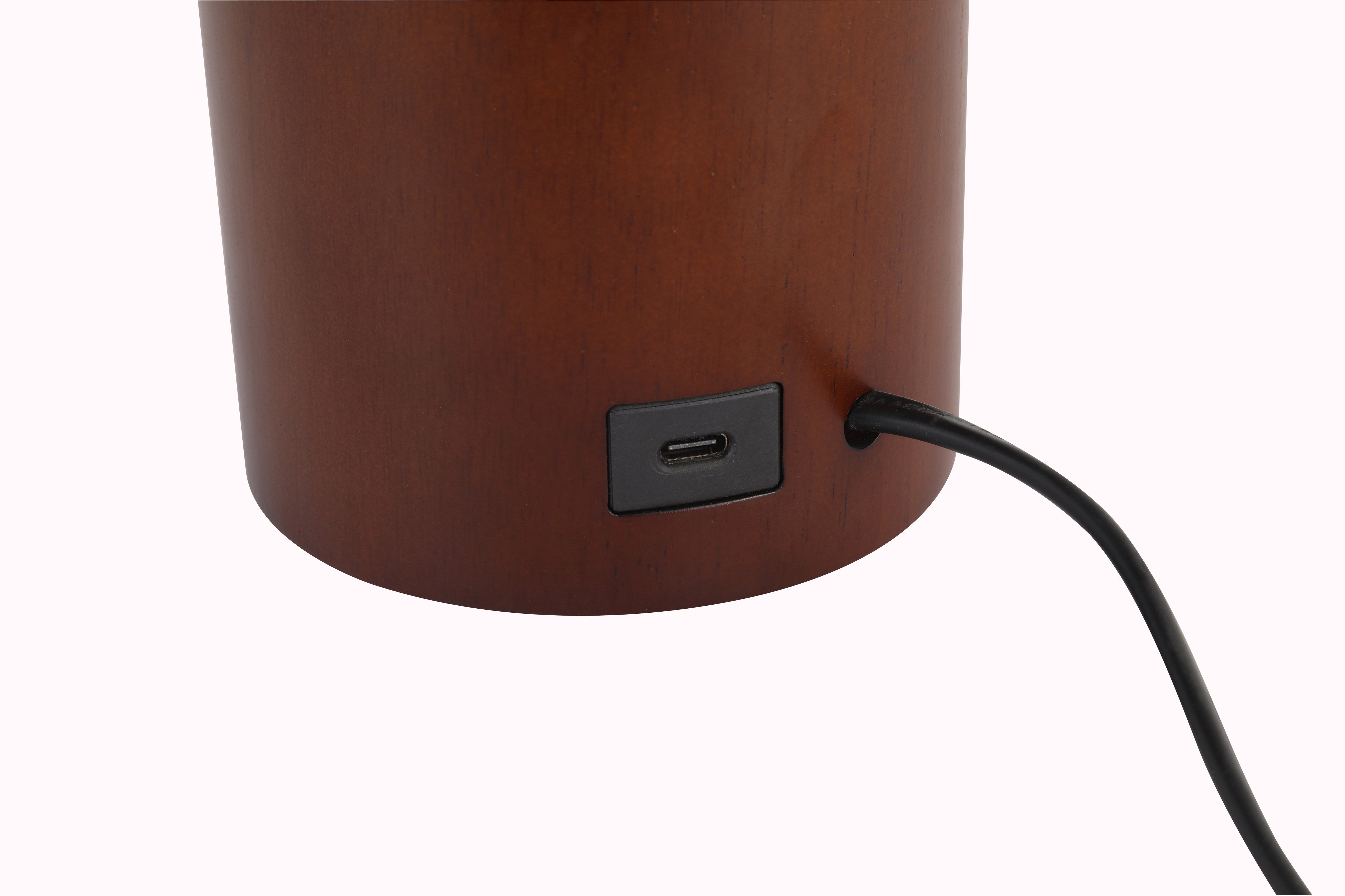 Brown cylindrical object with a USB port on a white background