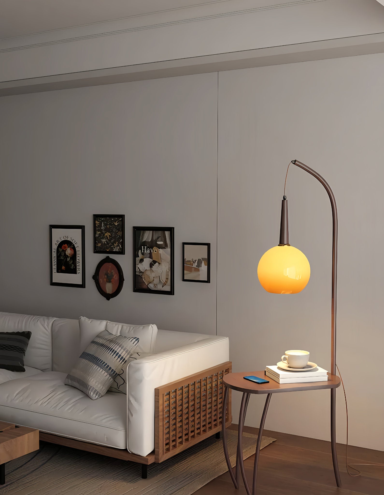 Modern living room with a sofa, Domus Pollo Floor Lamp with walnut stand and built-in side table and wall art