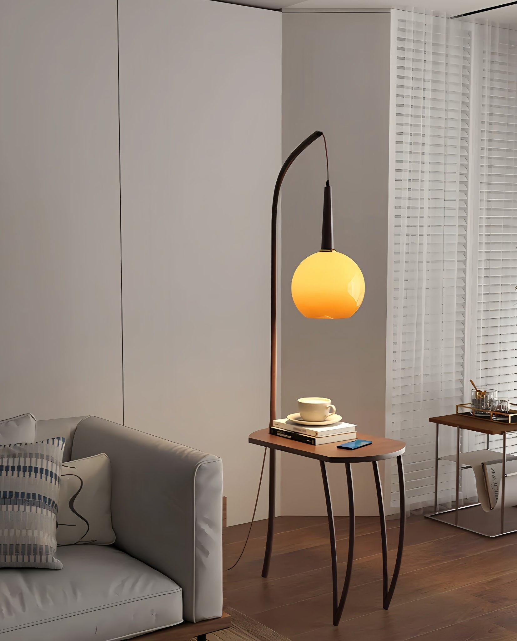 Domus Pollo Floor Lamp with walnut stand and built-in side table with a yellow bulb in a living room setting.