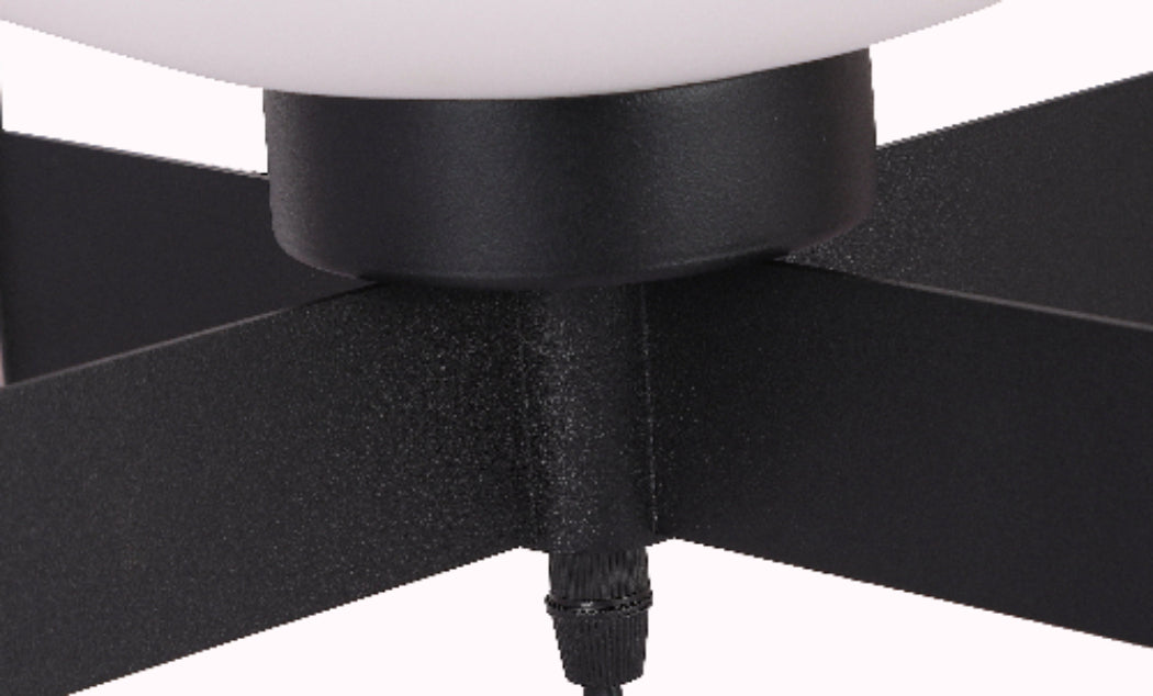 Close-up of a black office chair base with a white cushioned seat on a white background